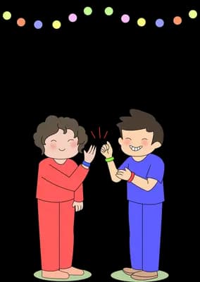 Two children lighting a sparkler together under a string of coloured lights