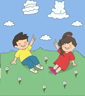 Boy and girl sitting on a green field watching cat-shaped clouds