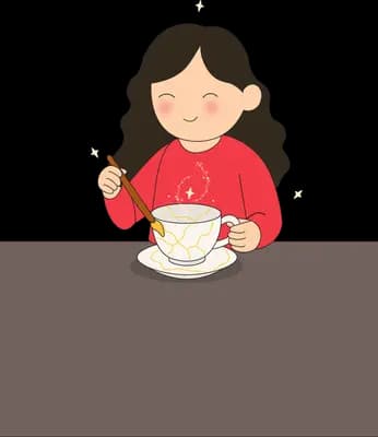 Woman sipping from a teacup at a dark table