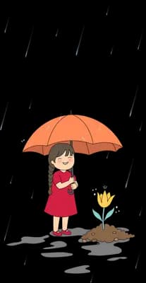 Small girl under an orange umbrella in heavy rain beside a tulip growing in a patch of soil