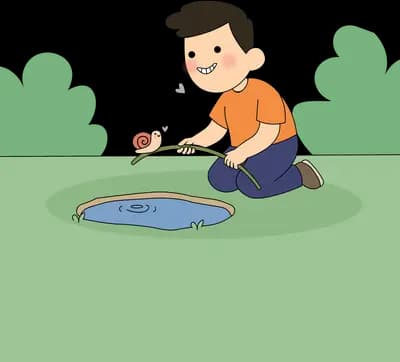 Boy kneeling beside a small pond on a green lawn holding a tiny creature