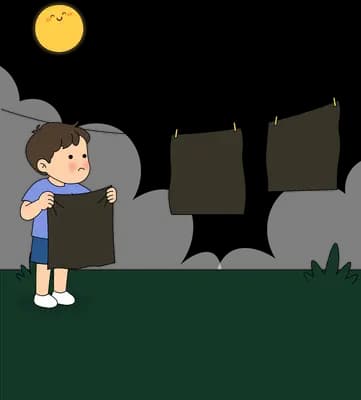 Boy pulling a dark garment down from the clothesline