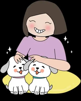 Woman sitting with two puppies on a cushion