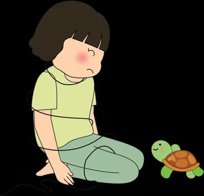 Girl sitting on the floor beside a turtle