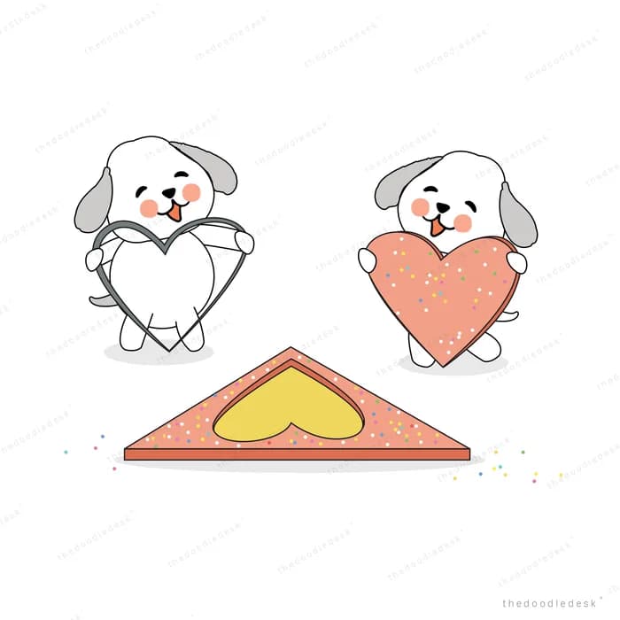Two dogs holding white and red hearts on a mat