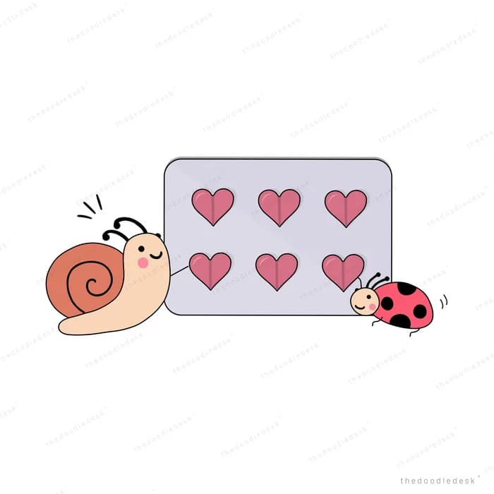 Snail beside a card printed with hearts