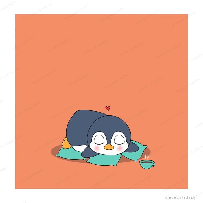 Penguin lying on a green mat with a heart
