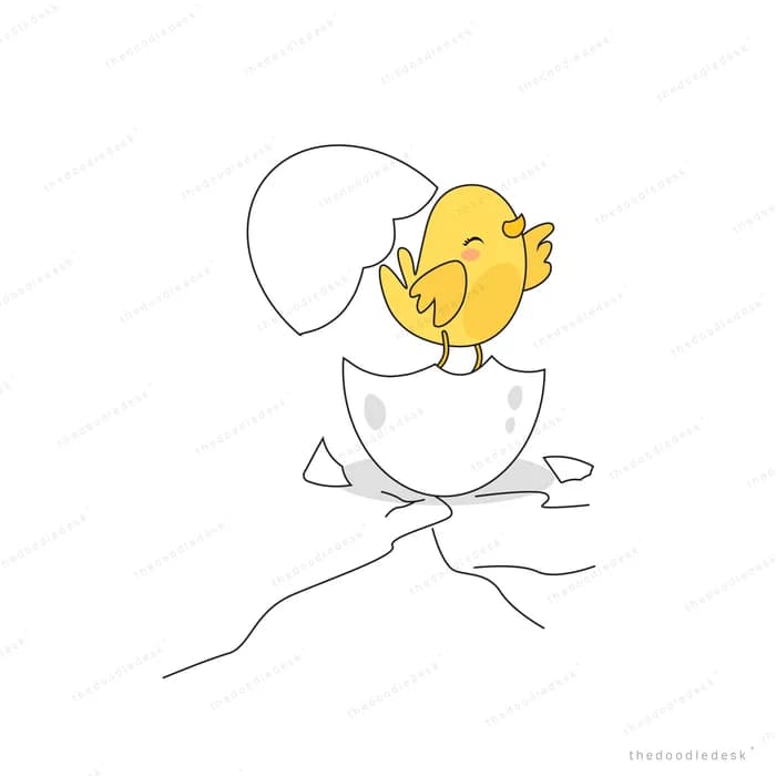 Chick sitting in a cracked eggshell