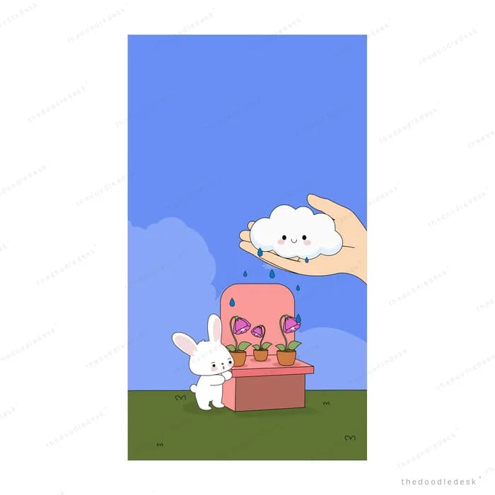 White cat by a pink armchair against a blue backdrop
