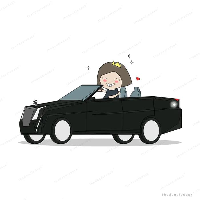 Person driving a long black convertible