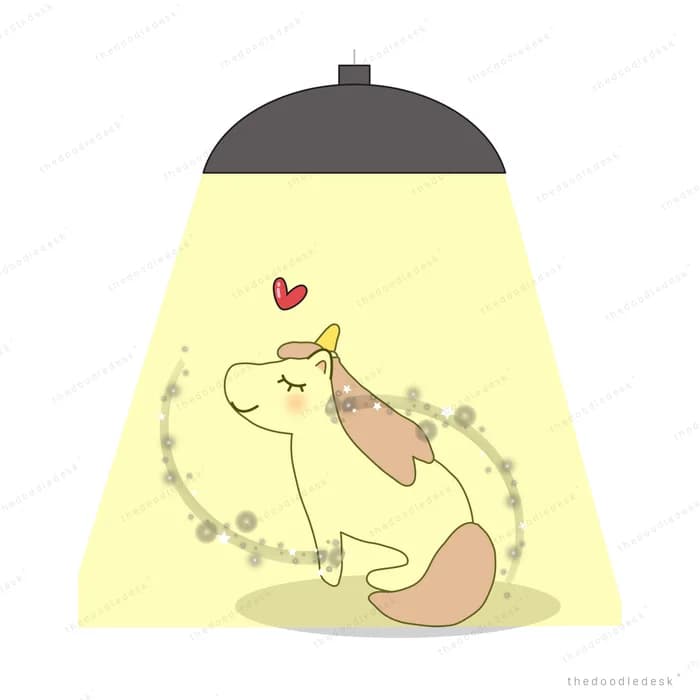 Unicorn resting under a hanging lamp draped with a beaded garland