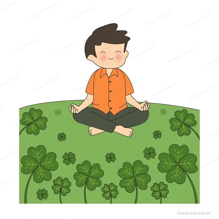 Boy in an orange shirt sitting cross-legged meditating on a field of clover
