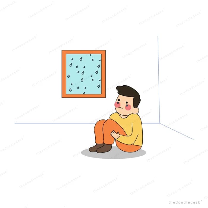 Man sitting on the floor beside a framed picture on the wall