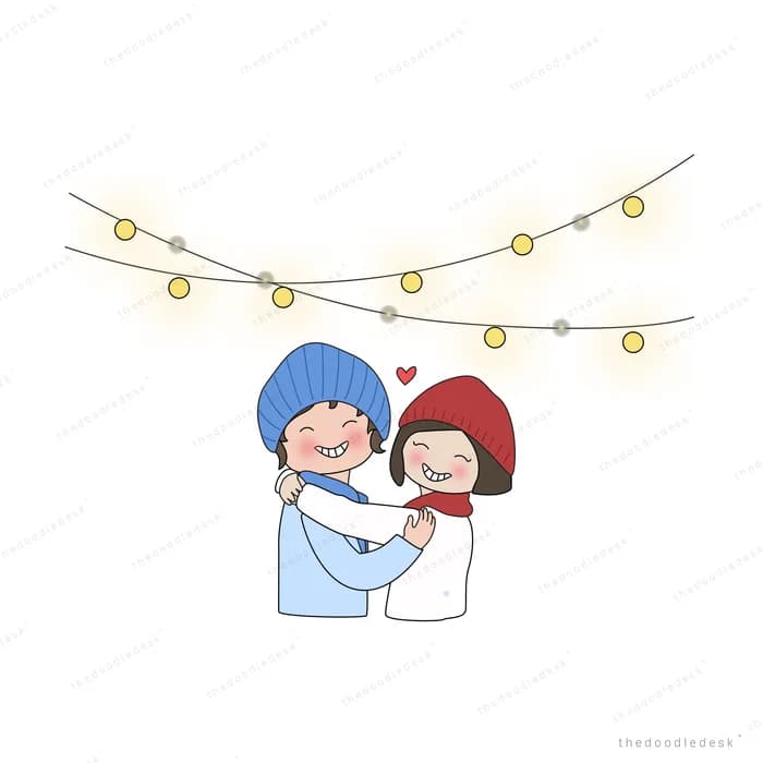 Couple embracing under a string of fairy lights