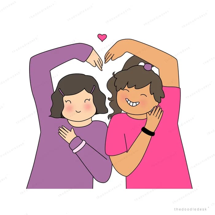 Two women lying head to head forming a heart with their arms