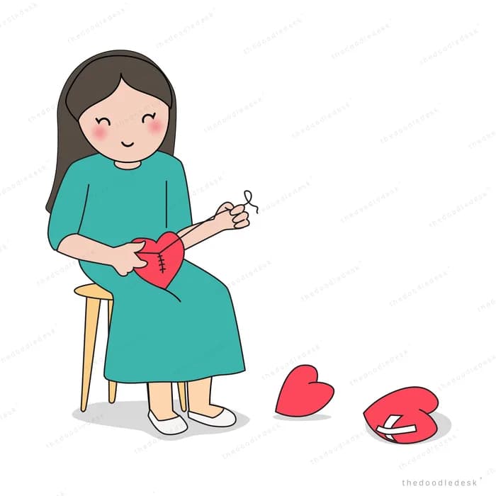 Woman on a stool holding a red heart with more at her feet