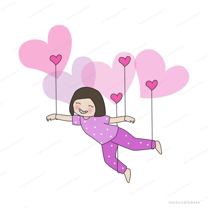 Girl swinging from pink heart-shaped balloons