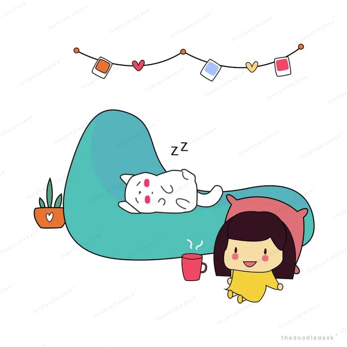 Girl reclining on a teal sofa under bunting