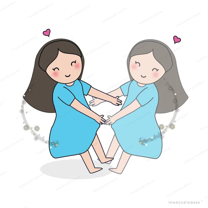 Two women sitting facing each other with hearts