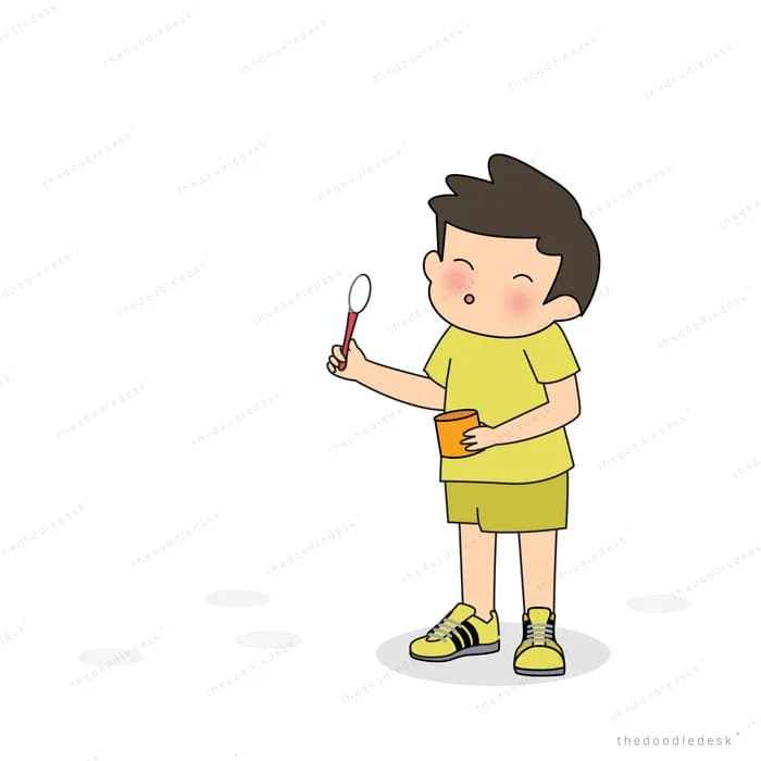 Boy holding up a small lit candle