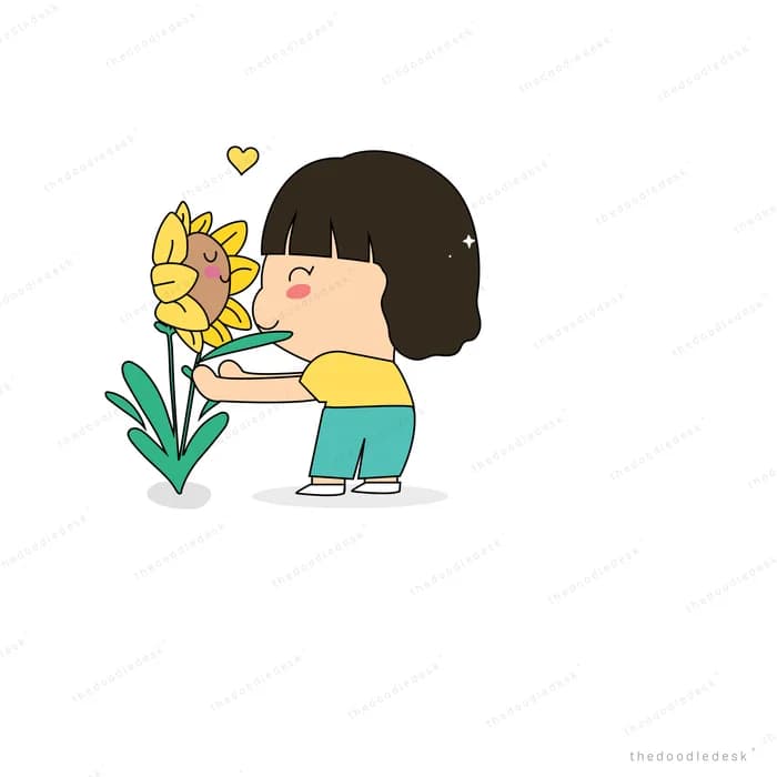 Boy leaning to smell a tall yellow flower