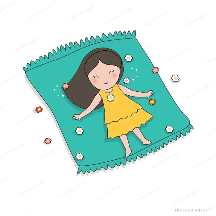 Girl lying on a teal picnic blanket with daisies