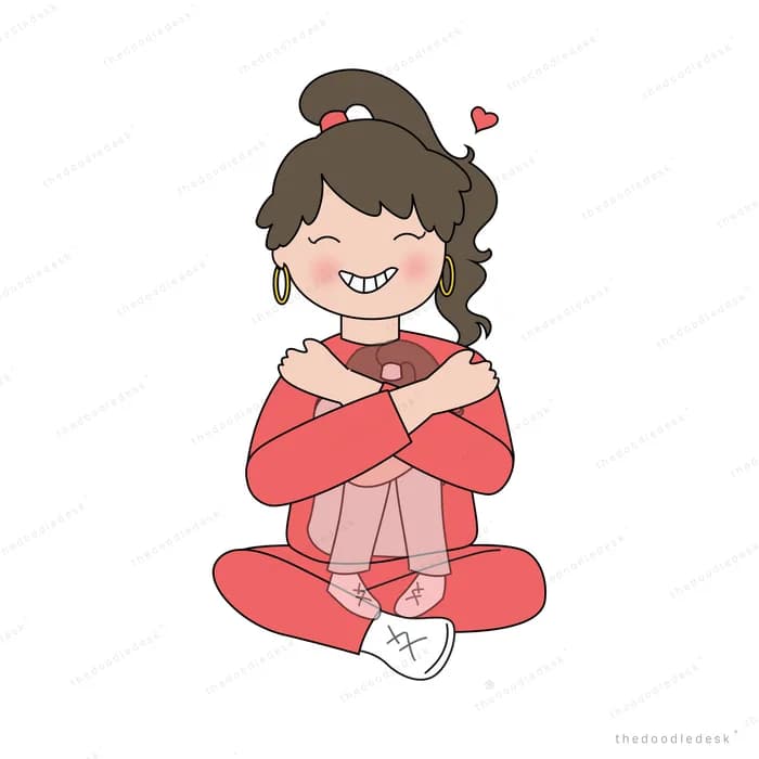 Woman sitting cross-legged hugging herself