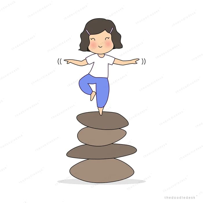 Woman balancing on a stack of smooth stones