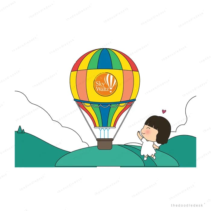 Boy watching a hot air balloon rise from hills