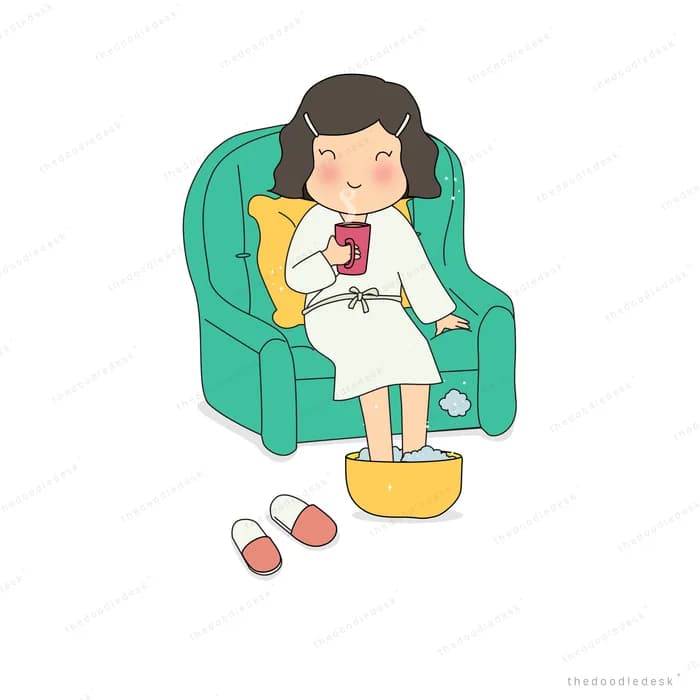 Woman with a mug relaxing in a green armchair