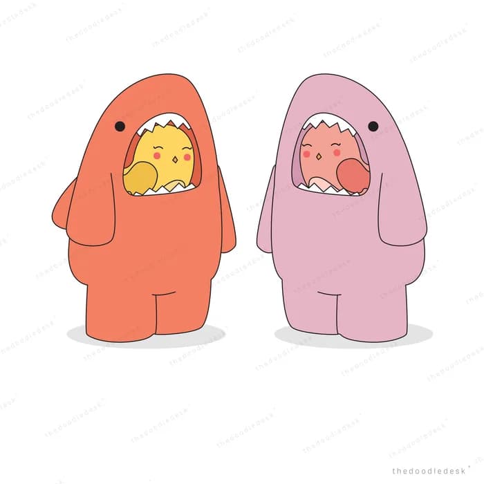 Two children in shark onesie costumes