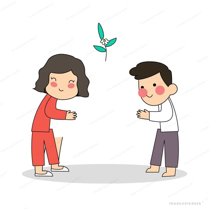 Two children exchanging a small seedling