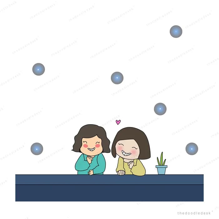 Two children behind a dark ledge with bubbles