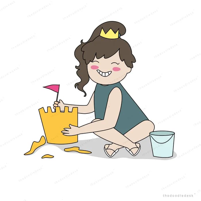 Girl in a crown building a sandcastle
