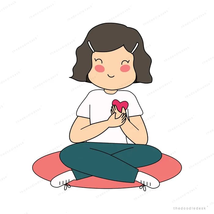 Girl sitting cross-legged on a red cushion holding a red heart to her chest