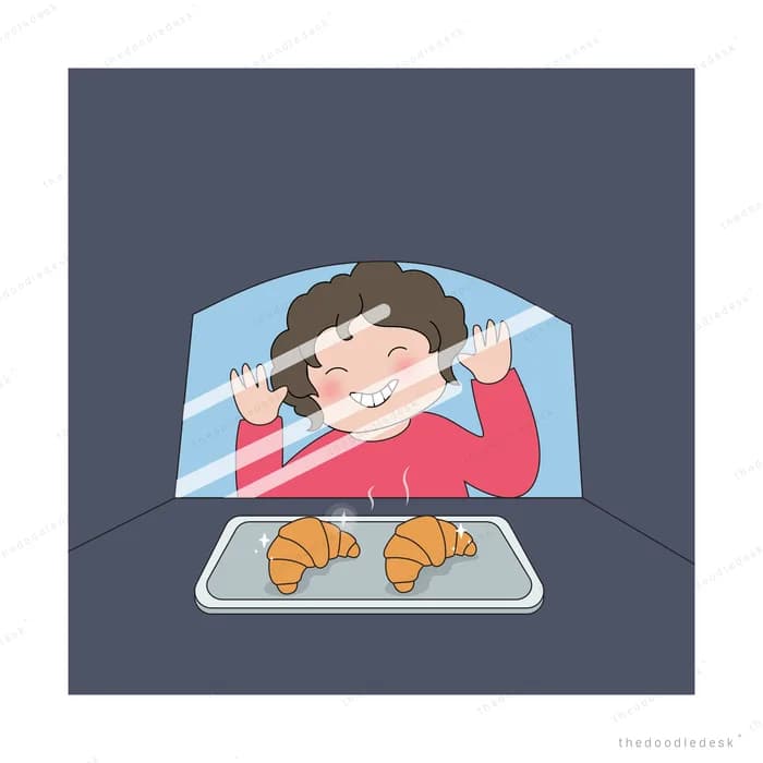 Girl pressing against a bakery window looking at croissants on a tray