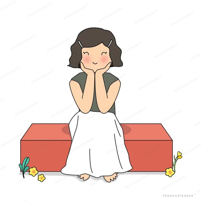 Woman in a white dress sitting on a red block resting her chin on her hands