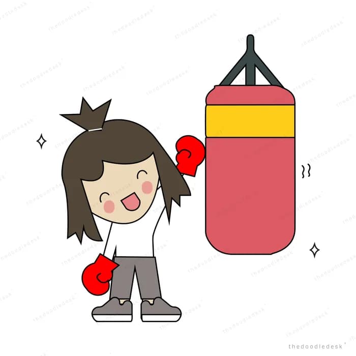 Girl in boxing gloves punching a red hanging punching bag