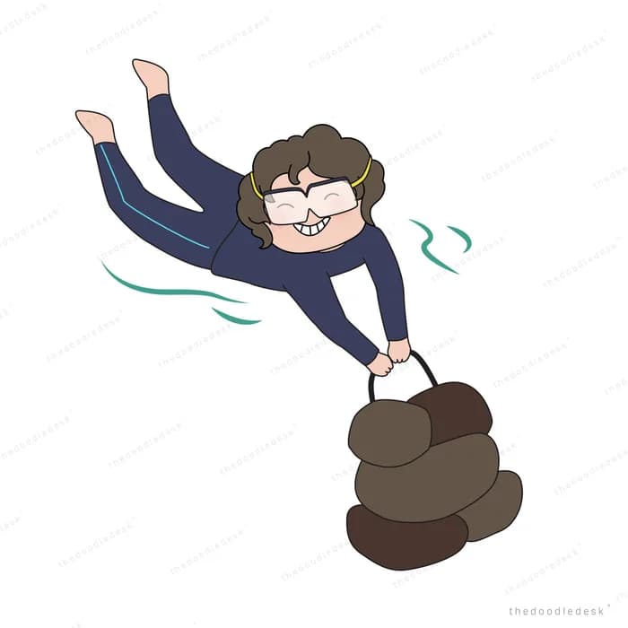 Boy in glasses leaping forward while dragging a heavy dark sack behind him