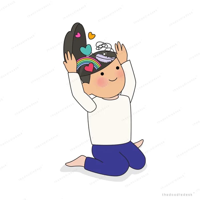 Boy kneeling and lifting a dark wig above his head with both hands