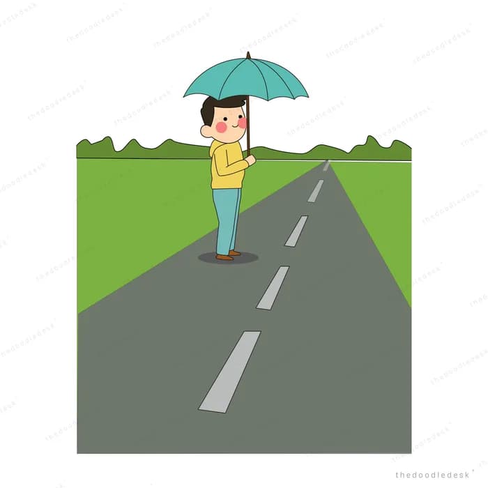 Boy standing alone with an umbrella on an empty grey road