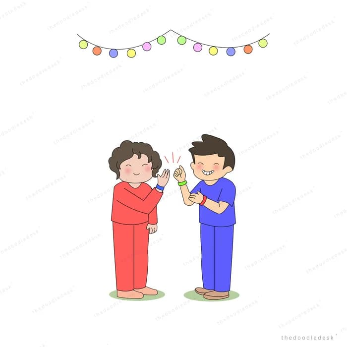 Two children lighting a sparkler together under a string of coloured lights