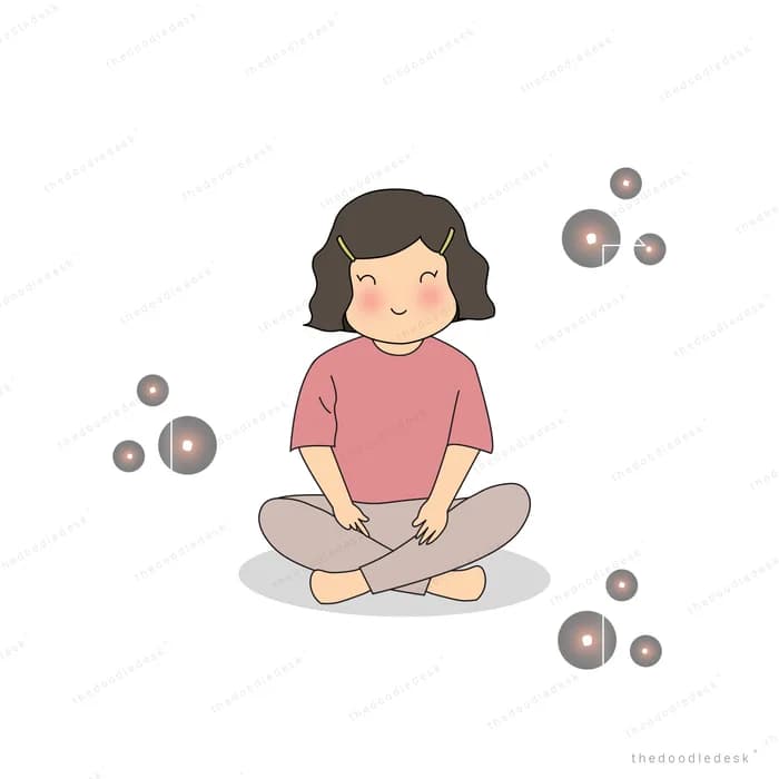 Girl sitting cross-legged with small grey bubbles floating around her
