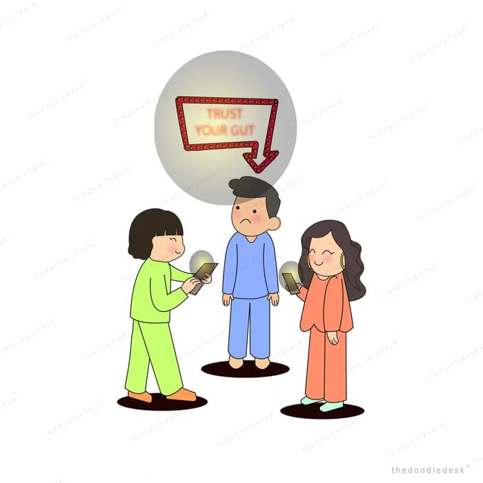 Three people talking while a sign with an arrow points down at the man between them