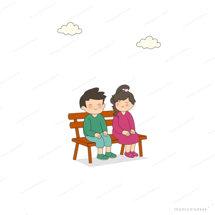 Boy and girl sitting side by side on a wooden bench