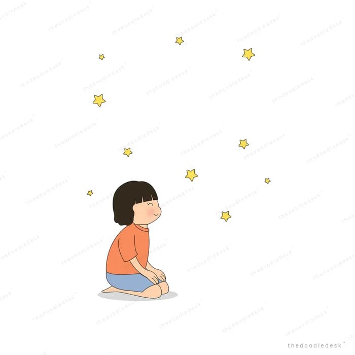 Small girl kneeling alone as golden petals float around her in a large empty field