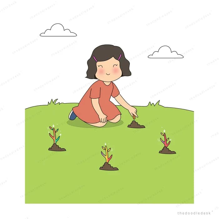 Girl kneeling on the grass planting a row of small saplings