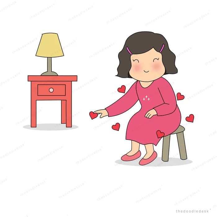 Woman sitting by a red bedside table with a lamp, letting small hearts fall