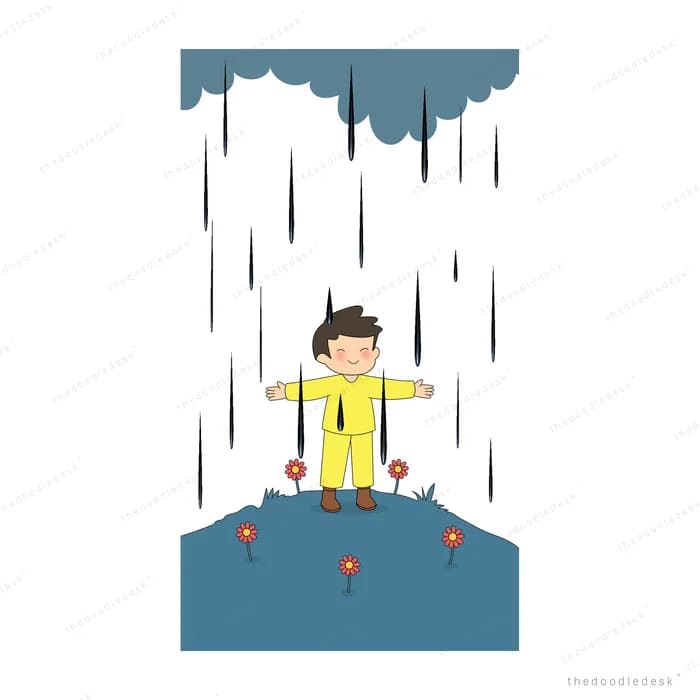 Small boy in a yellow raincoat standing arms out under a heavy raincloud