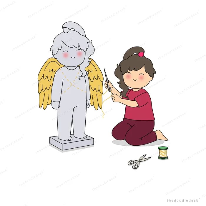 Girl kneeling with needle and thread sewing golden wings onto a grey angel statue